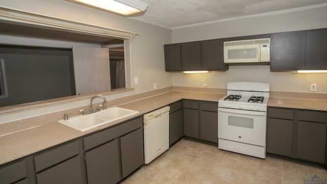 kitchen featuring ornamental molding, white appliances, gray cabinetry, and sink