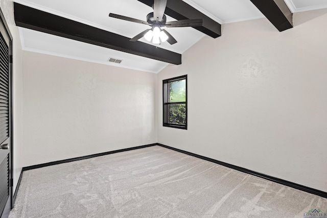 unfurnished room featuring vaulted ceiling with beams, ceiling fan, and light colored carpet