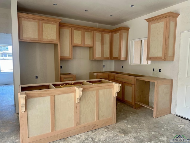 kitchen featuring light brown cabinets