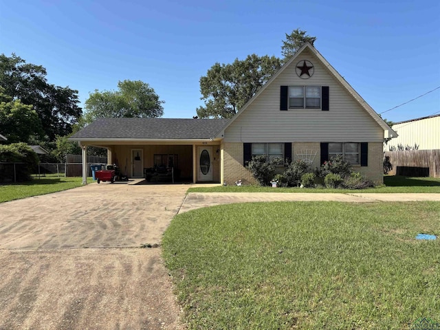 411 E Carolanne Blvd, Marshall, TX 75672 - traditional home with brick siding, driveway, and an attached carport
