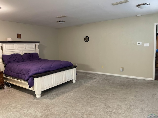 411 E Carolanne Blvd, Marshall, TX 75672 - bedroom with carpet and baseboards