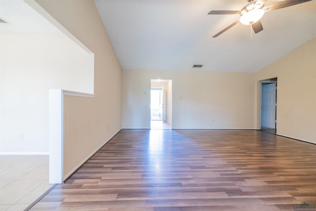 empty room with ceiling fan and wood-type flooring