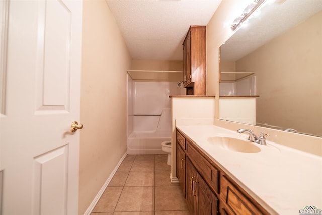 full bathroom featuring toilet, vanity, tile patterned floors, a textured ceiling, and shower / bathing tub combination