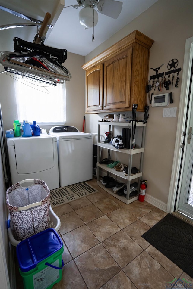 3713 Bell Mdws, Longview, TX 75605 - clothes washing area featuring washer and dryer, tile patterned floors, cabinet space, a ceiling fan, and baseboards