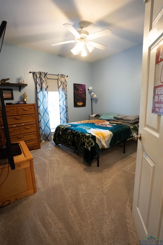 3713 Bell Mdws, Longview, TX 75605 - carpeted bedroom with ceiling fan