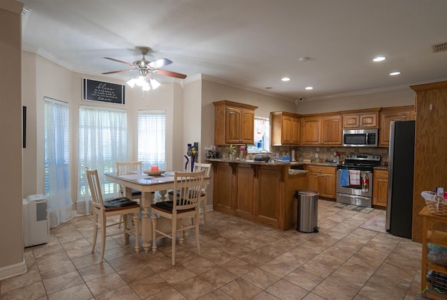 3713 Bell Mdws, Longview, TX 75605 - dining area featuring a ceiling fan, crown molding, and recessed lighting
