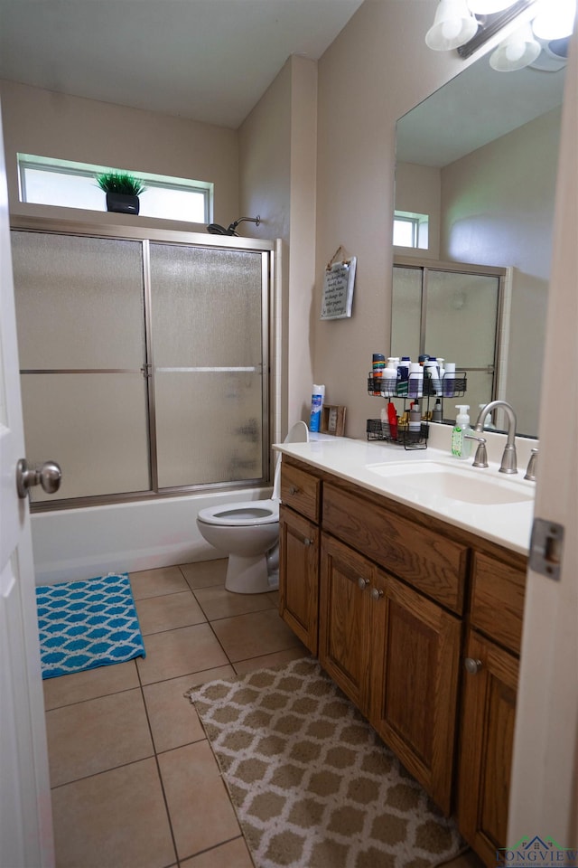 3713 Bell Mdws, Longview, TX 75605 - bathroom featuring plenty of natural light, toilet, and tile patterned floors