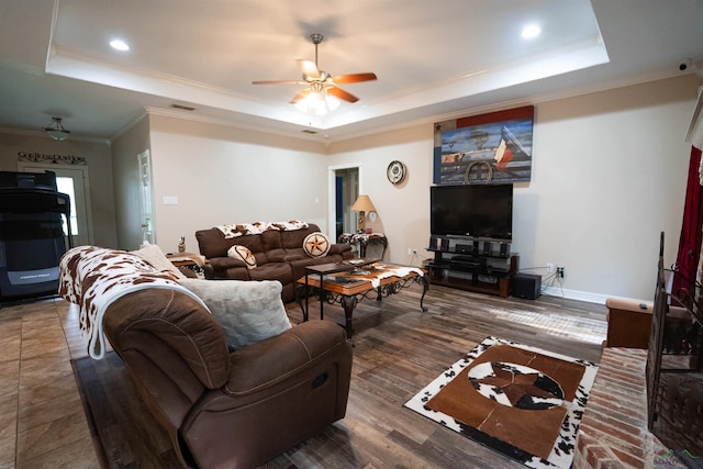 3713 Bell Mdws, Longview, TX 75605 - living area with a raised ceiling, a ceiling fan, crown molding, and recessed lighting