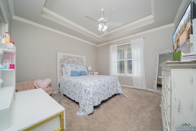 2931 Meadow Brook Trl, Tyler, TX 75701 - bedroom featuring a tray ceiling, ornamental molding, carpet, and ceiling fan