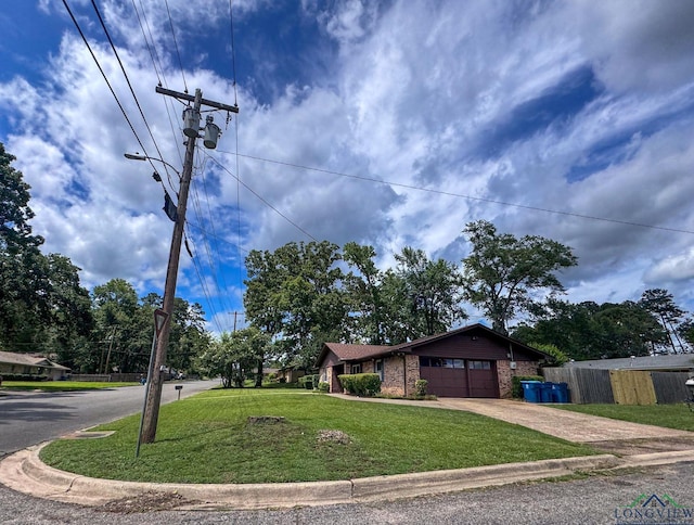 902 Warren Dr, Marshall, TX 75672 - ranch-style home with driveway, an attached garage, and brick siding