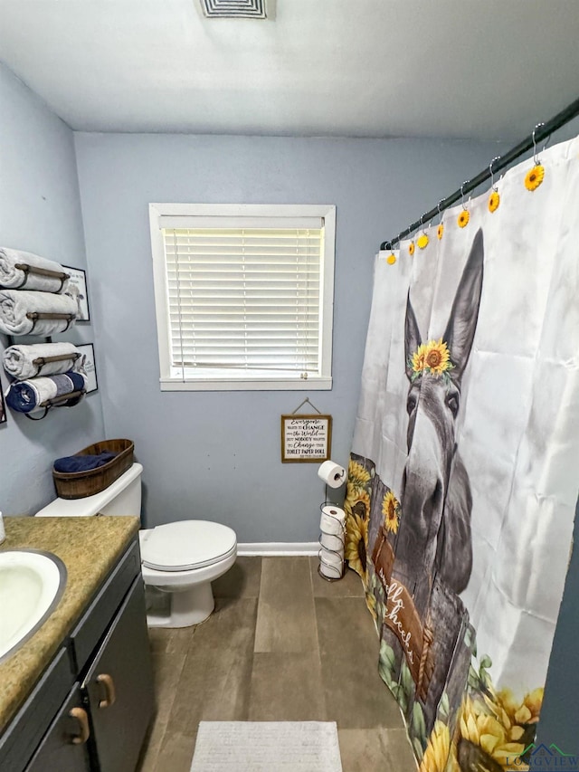 902 Warren Dr, Marshall, TX 75672 - bathroom with vanity and a shower with shower curtain