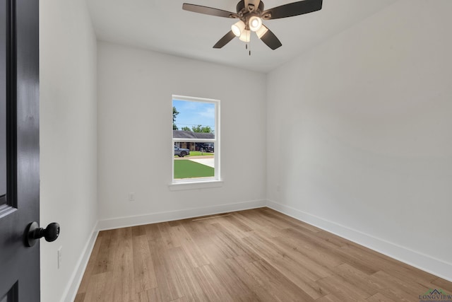 1507 Wellington Ln, Longview, TX 75605 - spare room featuring light wood-type flooring, baseboards, and ceiling fan