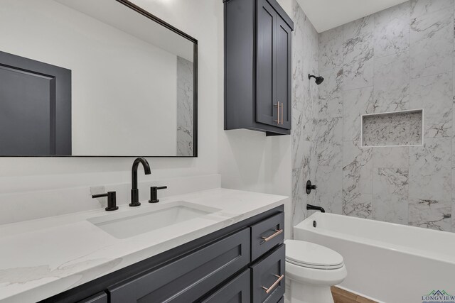 1507 Wellington Ln, Longview, TX 75605 - bathroom featuring vanity, toilet, and shower / tub combination