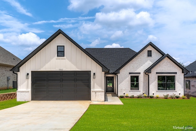1507 Wellington Ln, Longview, TX 75605 - view of front facade featuring brick siding, board and batten siding, a front yard, concrete driveway, and a garage