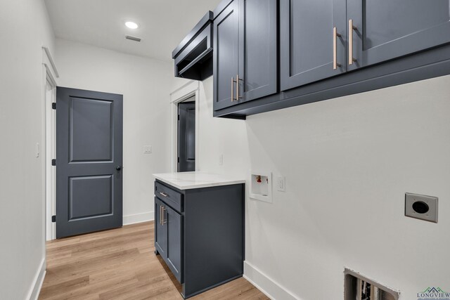 1507 Wellington Ln, Longview, TX 75605 - washroom featuring electric dryer hookup, washer hookup, and baseboards