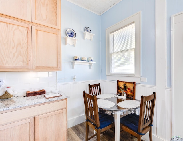 dining area with wood-type flooring