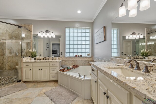 bathroom with a stall shower, a sink, a bath, and crown molding