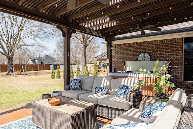 view of patio / terrace with ceiling fan, fence, outdoor lounge area, and a pergola