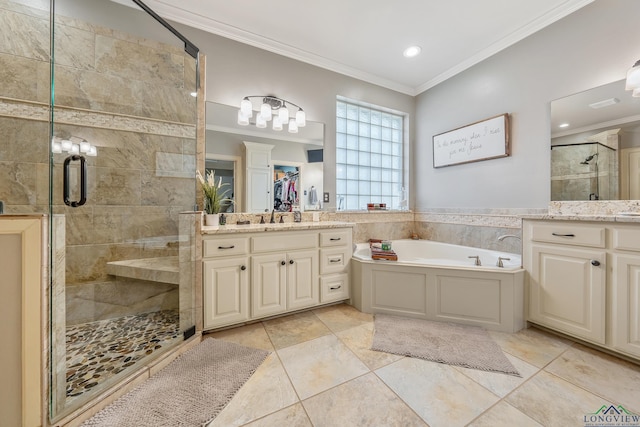 full bathroom with a garden tub, two vanities, a sink, a stall shower, and crown molding