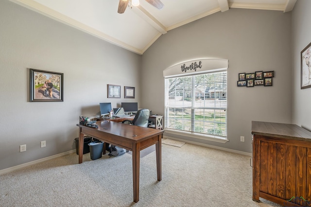 carpeted office space with lofted ceiling with beams, ceiling fan, and baseboards