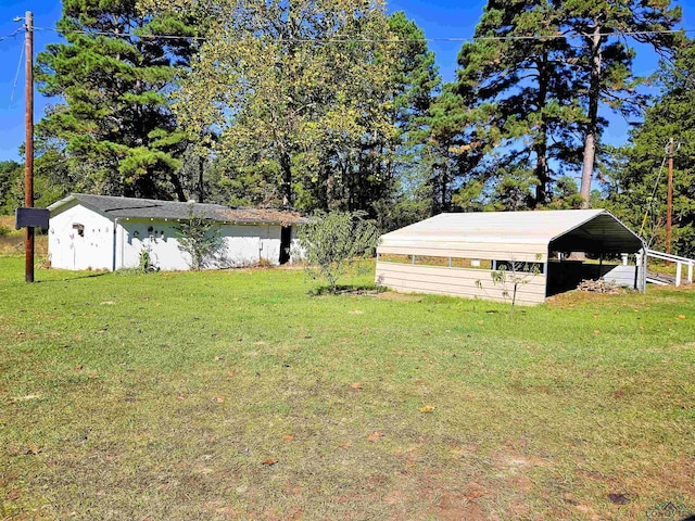 view of yard featuring a carport