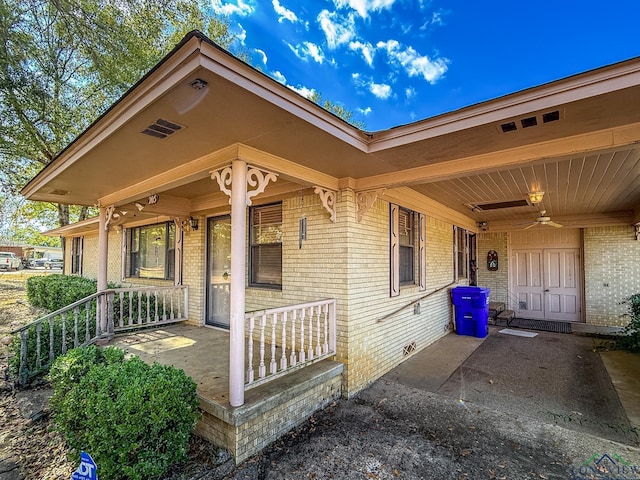 doorway to property with a porch