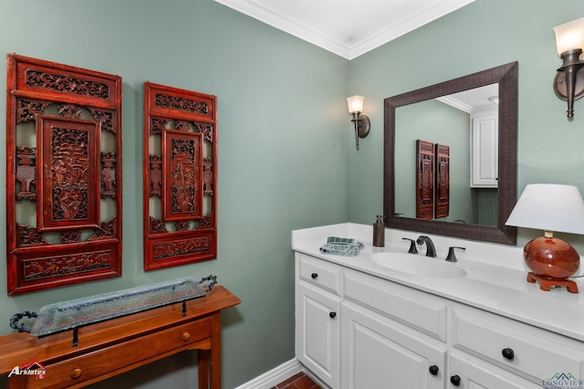 bathroom with vanity and ornamental molding