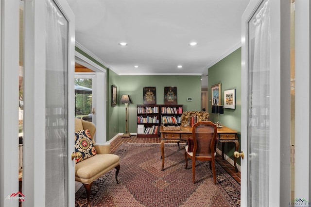 home office with ornamental molding and hardwood / wood-style flooring