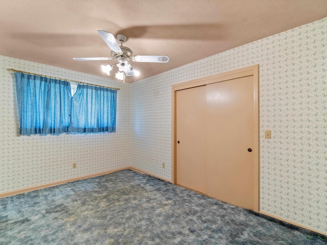 unfurnished bedroom featuring carpet flooring, ceiling fan, and wallpapered walls