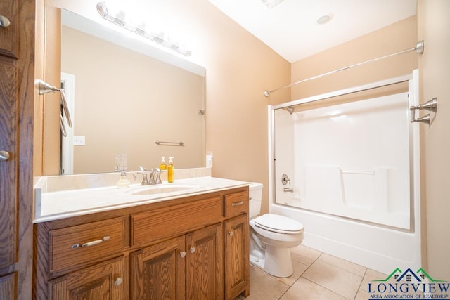 full bathroom featuring tile patterned floors, vanity, toilet, and shower / tub combination