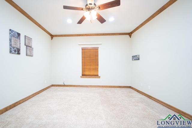 unfurnished room featuring light colored carpet, ceiling fan, and ornamental molding