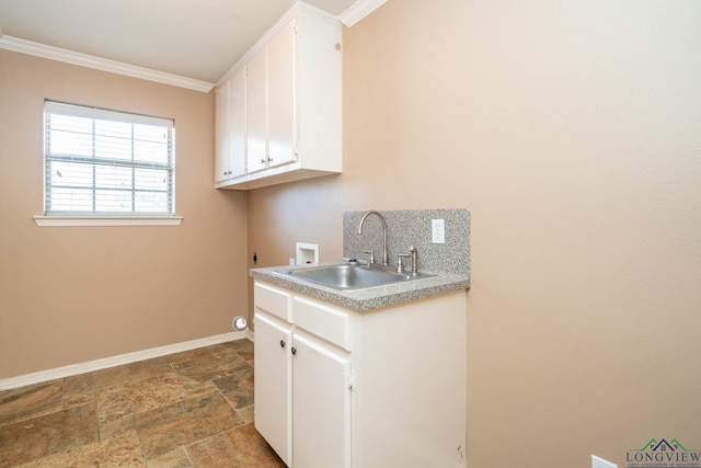 washroom featuring washer hookup, cabinet space, a sink, electric dryer hookup, and baseboards