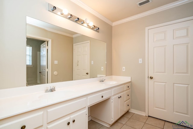 bathroom featuring double vanity, visible vents, ornamental molding, a sink, and tile patterned floors