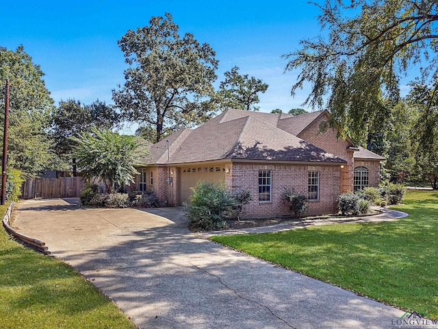 view of side of home featuring a yard and a garage