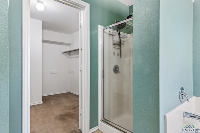 bathroom featuring walk in shower