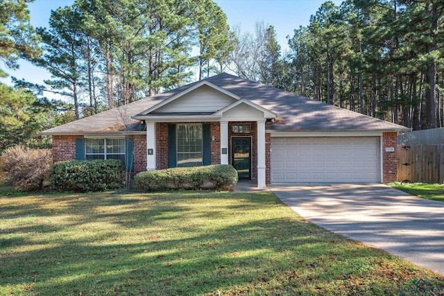 ranch-style house with a garage and a front lawn