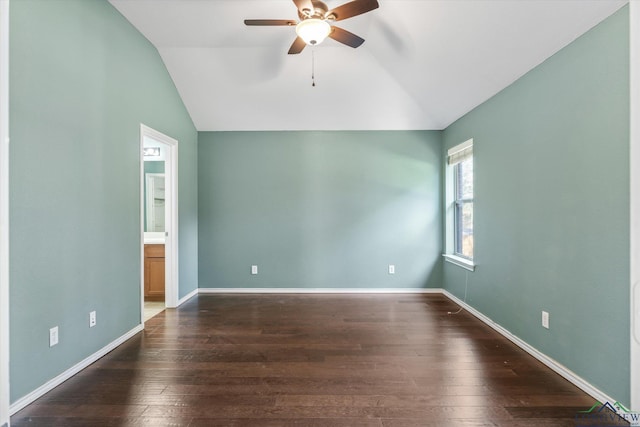 spare room featuring dark hardwood / wood-style floors, ceiling fan, and lofted ceiling