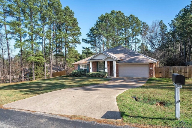 view of front facade featuring a garage and a front lawn