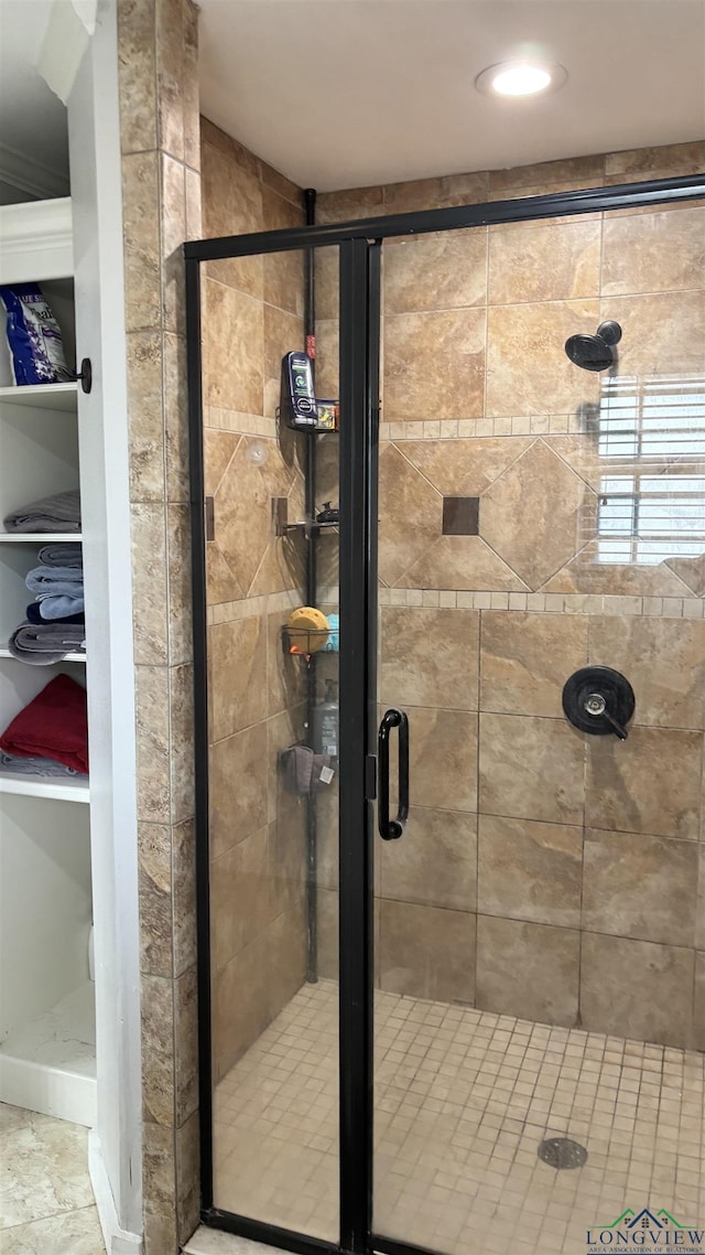bathroom with a stall shower