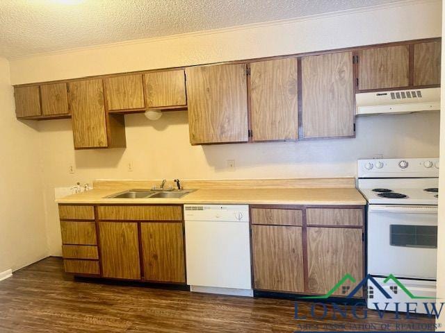 3023A Bernice, Longview, TX 75605 - kitchen featuring white appliances, under cabinet range hood, light countertops, a textured ceiling, and dark wood-style floors