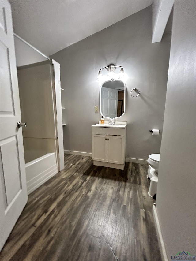 bathroom featuring hardwood / wood-style floors, vanity, and toilet