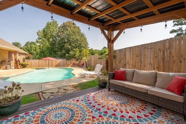 view of pool with a patio and an outdoor hangout area