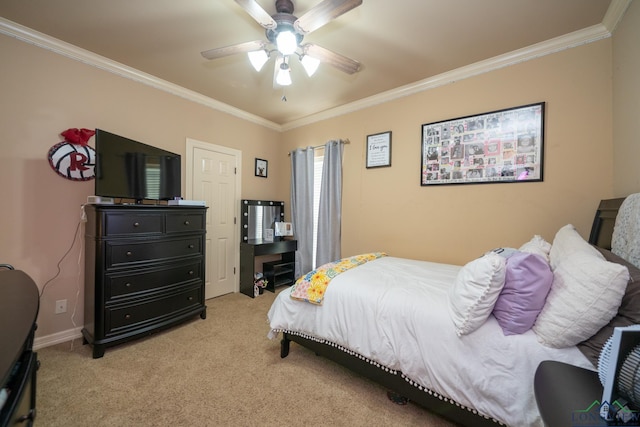 carpeted bedroom with ceiling fan and crown molding