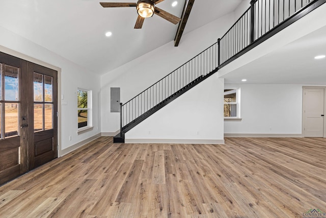 foyer featuring beam ceiling, high vaulted ceiling, light hardwood / wood-style flooring, and ceiling fan