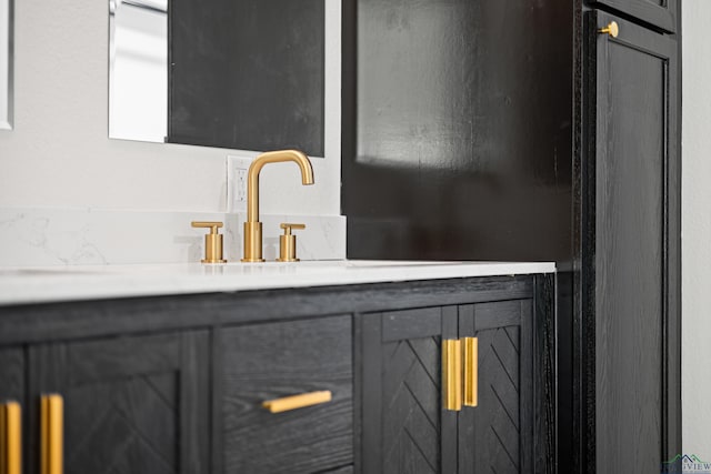 interior space with vanity and wet bar