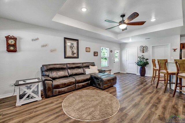 403 Caroline Ln, Bullard, TX 75757 - living room with ceiling fan, dark hardwood / wood-style floors, and a raised ceiling