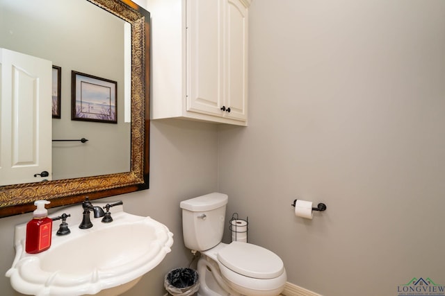 335 Winding Way, Hallsville, TX 75650 - bathroom with a sink and toilet