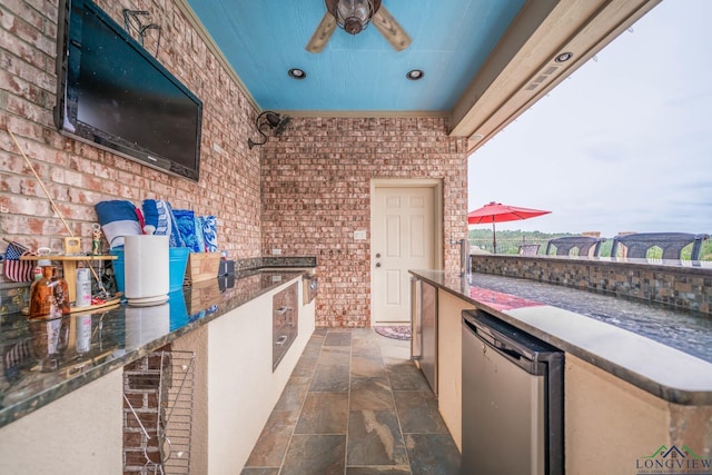 335 Winding Way, Hallsville, TX 75650 - view of patio / terrace with an outdoor kitchen and a ceiling fan