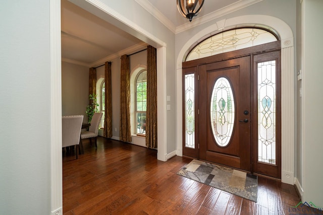 335 Winding Way, Hallsville, TX 75650 - foyer entrance featuring wood finished floors, crown molding, and baseboards