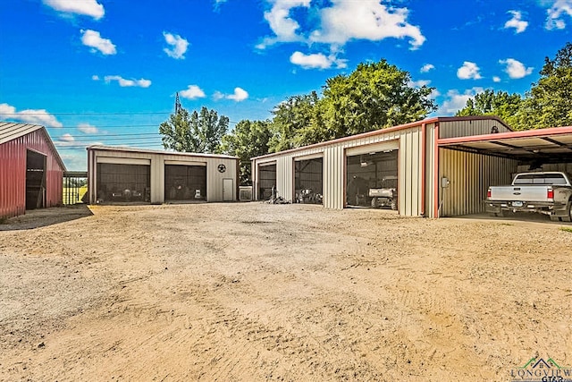 garage with a carport